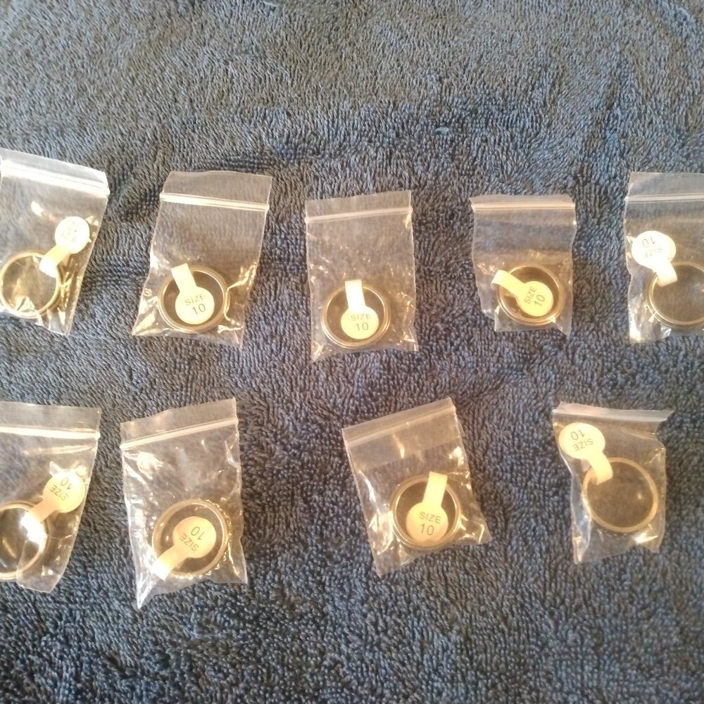 Lot of 9 New Spinner Rings size 10